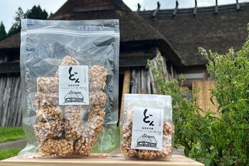 新商品「はさがけ米の玄米おこし・どん」を発売 - 伝統の味わいが楽しめるサクサク食感のお菓子