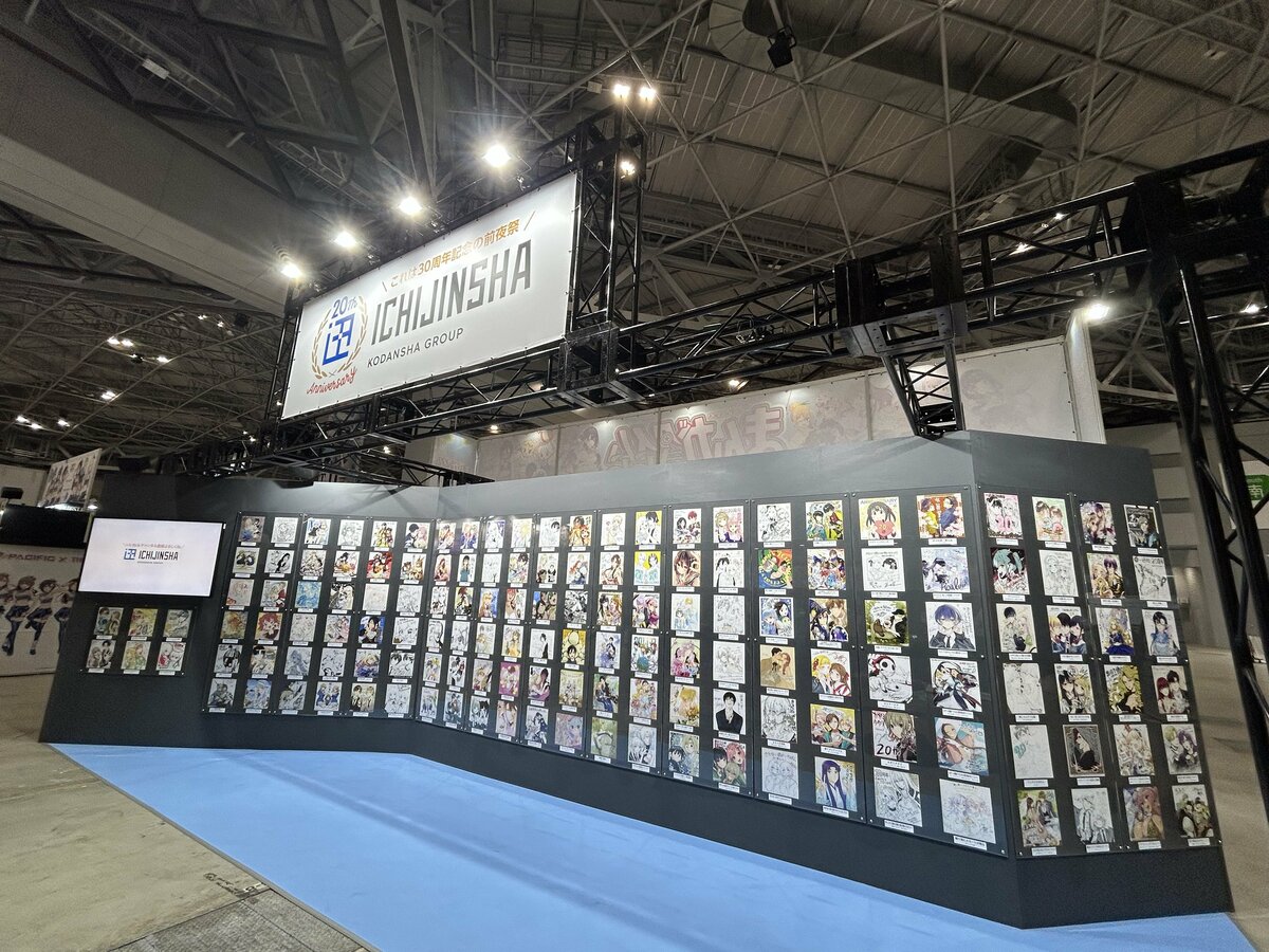 コミックマーケット106にて商号20周年を記念した総勢150名による一迅社